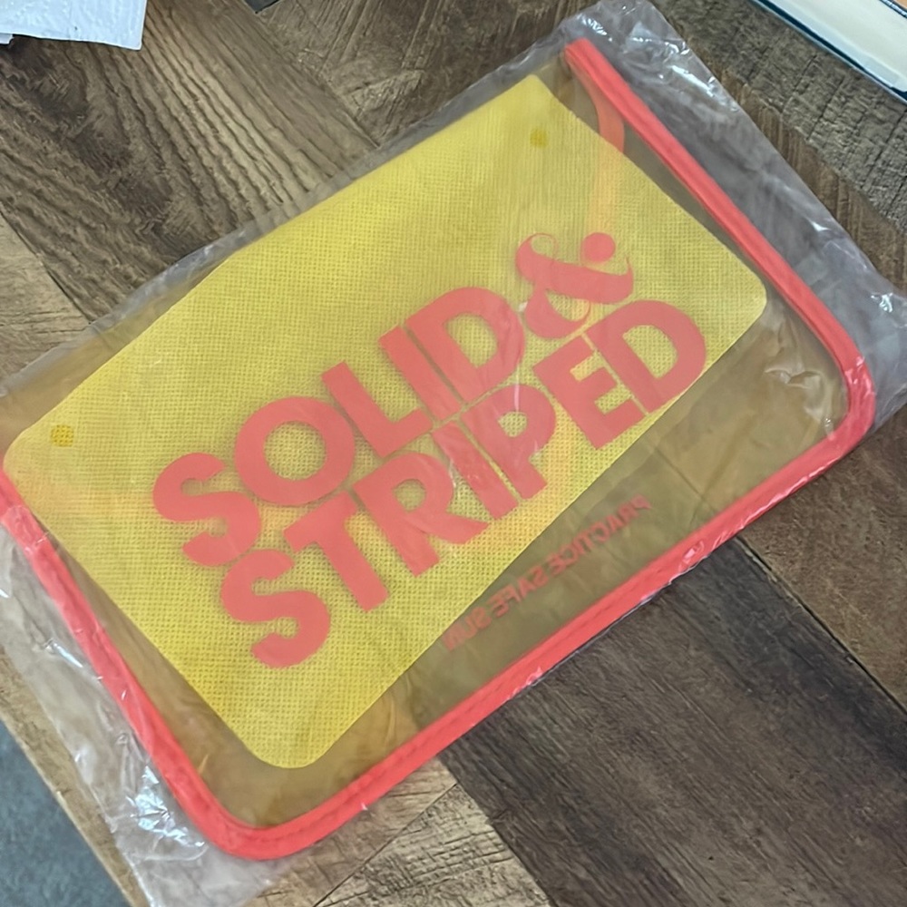 NWT Solid & Striped Pouch